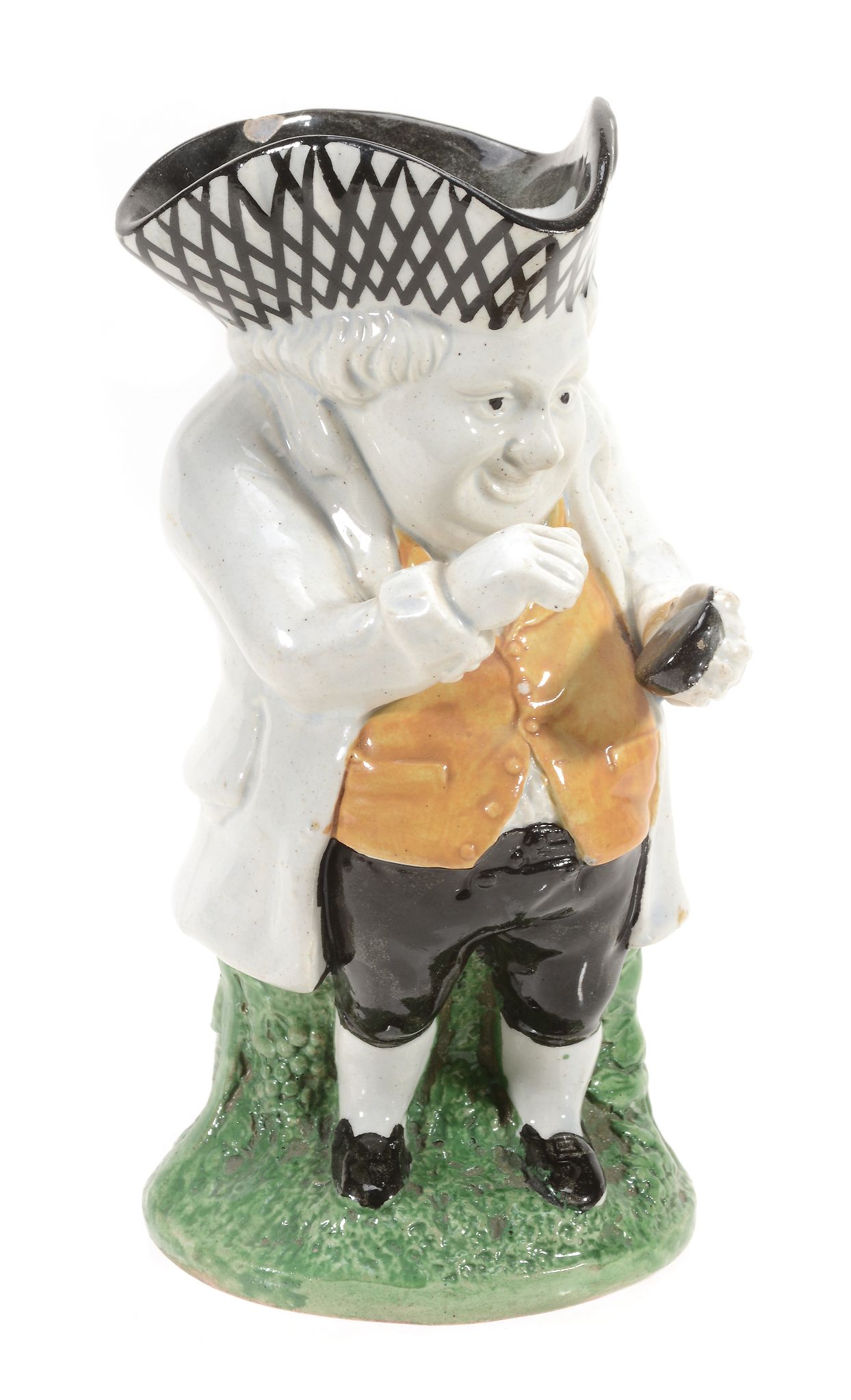 An English pearlware `Snuff-Taker` Toby jug, circa 1830 An English pearlware `Snuff-Taker` Toby jug,