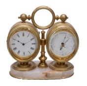 A French gilt brass and onyx combination desk timepiece with aneroid... A French gilt brass and onyx