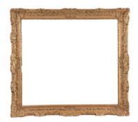 A carved and gilt wood frame in Louis XIV style - 19th century overall dimensions: 45 1/2 x 50 1/2