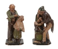 A pair of Wilhelm Schiller & Sons cold-painted terracotta models of a... A pair of Wilhelm