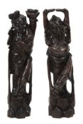 A Pair of Carved Wood Figures of Immortals A Pair of Carved Wood Figures of Immortals, each with