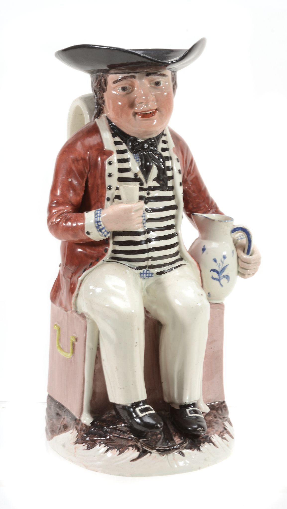 An English pearlware `Sailor` Toby jug, circa 1800 An English pearlware `Sailor` Toby jug, circa