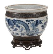 A late 19th century Chinese, crackle glazed ground jardinniere A late 19th century Chinese,