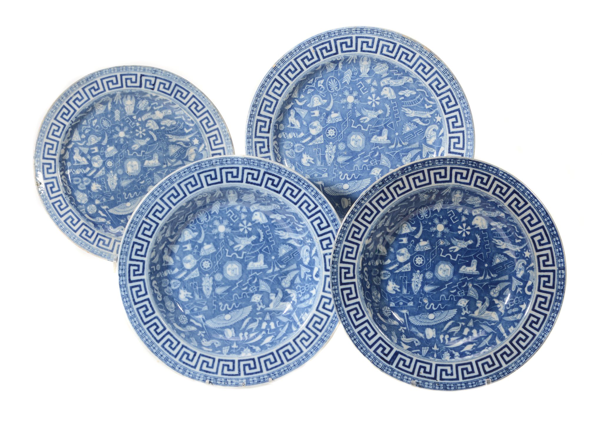 Four various English pearlware blue and white plates decorated with an... Four various English