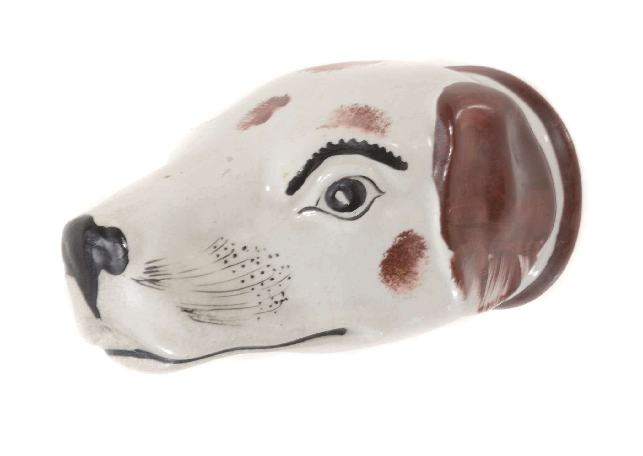 A Staffordshire pottery hound`s head stirrup cup, circa 1840 A Staffordshire pottery hound`s head