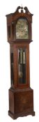 An Edwardian inlaid mahogany tubular bell quarter chiming eight-day longcase... An Edwardian