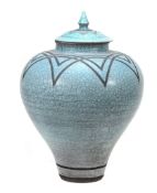 Paul Muchan, a large Studio pottery raku vase and cover, shaded light blue Paul Muchan, a large