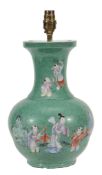 A Chinese green ground, famille rose vase decorated with children and ladies... A Chinese green