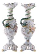 A pair of Nove pottery foliate vases with serpent handles, 20th century A pair of Nove pottery