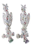 A pair of Nove pottery mythical beast candlesticks, 20th century A pair of Nove pottery mythical