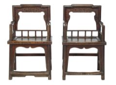 A pair of Chinese elm armchairs, 19th century  A pair of Chinese elm armchairs,   19th century, each