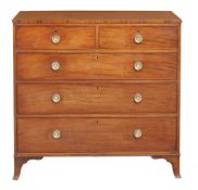 A George III mahogany chest of drawers circa 1800 rectangular top with two...  A George III mahogany
