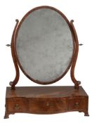 A George III mahogany serpentine fronted dressing mirror , circa 1770  A George III mahogany