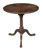 A George III mahogany tilt top tripod table circa 1780 with a circular top...  A George III mahogany