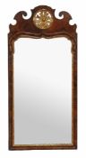 A George II walnut and parcel gilt wall mirror , circa 1740  A George II walnut and parcel gilt wall