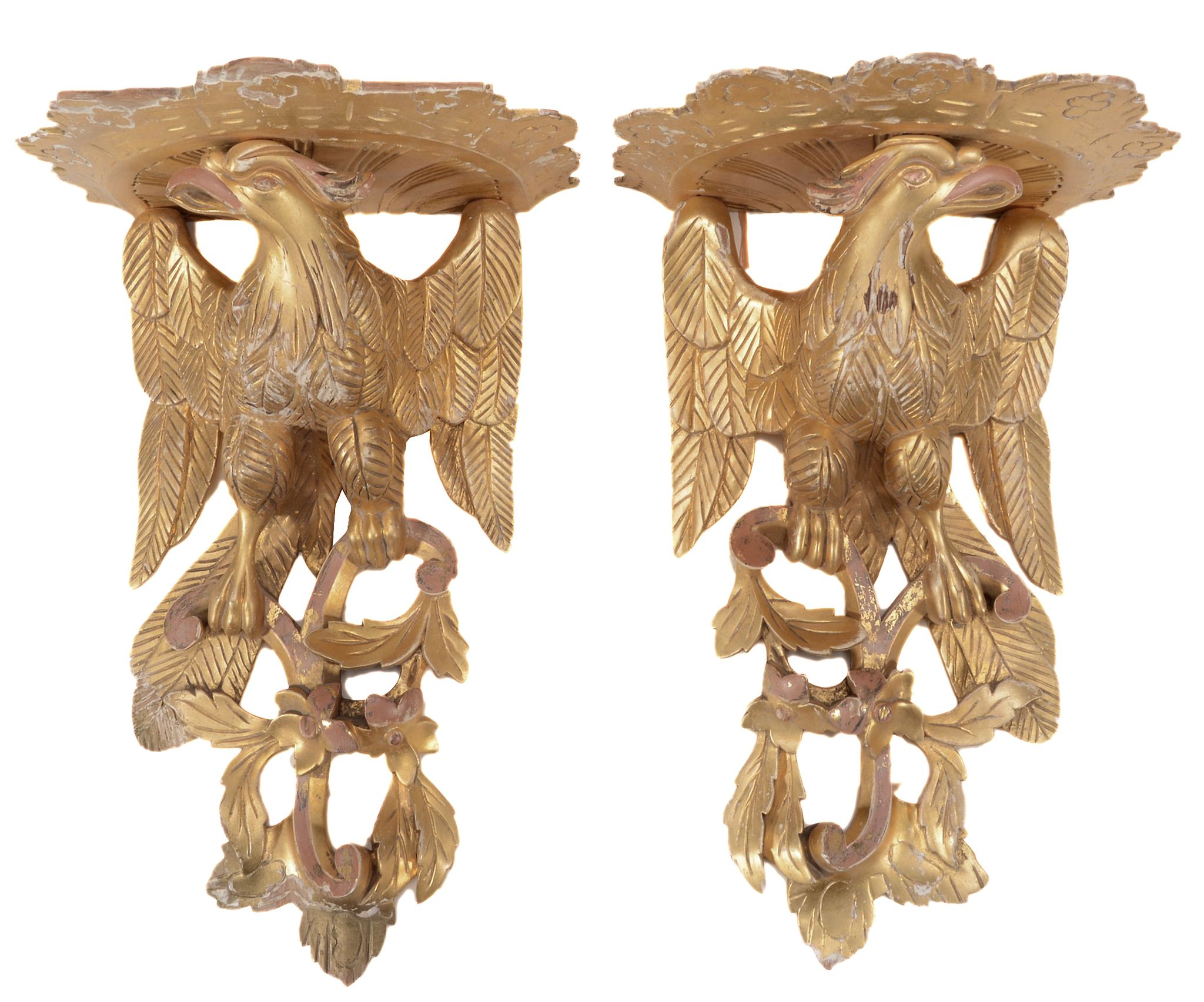 A pair of Continental carved and giltwood wall brackets, 20th century  A pair of Continental