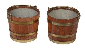 A pair of Irish brass bound peat buckets circa 1800 each is lined with brass...  A pair of Irish
