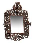 A Victorian carved fruitwood mirror in the manner of Andrew Lonnie  A Victorian carved fruitwood