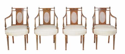 A set of four Sheraton Revival polychrome painted armchairs circa 1900 each...  A set of four