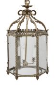 A substantial brass and bevelled glass hexagonal hall lantern in late George...  A substantial brass
