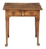 A George II walnut side table circa1735 with a rectangular top  A George II walnut side table