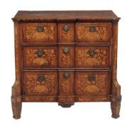 A Dutch floral marquerty chest, late 18th/early 19th Century with a shaped...  A Dutch floral