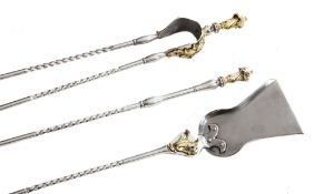 A set of three steel and brass mounted fire irons in George III style  A set of three steel and
