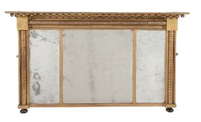 A George IV giltwood and composition wall mirror, circa 1825  A George IV giltwood and composition