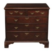 A George II oak chest of drawers, circa 1740  A George II oak chest of drawers,   circa 1740, the