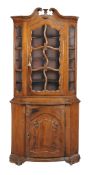 A Louis XV oak standing corner cabinet, circa 1750  A Louis XV oak standing corner cabinet,