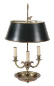 A brass and japanned metal mounted three light lampe bouillotte in Louis...  A brass and japanned