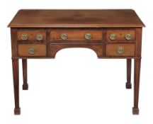 A mahogany kneehole dressing table, in George III style late 19th/early 20th...  A mahogany kneehole