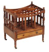 A George IV mahogany Canterbury circa 1825 the four slatted divisions with...  A George IV