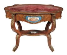 A French tulipwood, giltmetal and Sevres style porcelain mounted writing table  A French