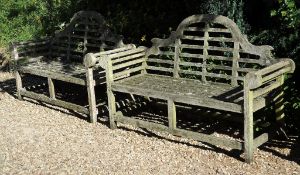 A pair of teak garden seats in the manner of Lutyens, second half 20th century  A pair of teak