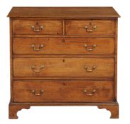 A George III oak chest of drawers with rectangular top  A George III oak chest of drawers   with