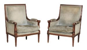 A pair of Louis Philippe mahogany armchairs circa 1840 each padded...  A pair of Louis Philippe