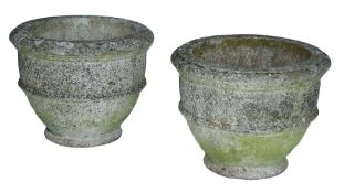 A pair of reconstituted stone garden urns, 20th century  A pair of reconstituted stone garden urns,