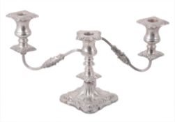 A silver three light candelabrum by Viners Ltd A silver three light candelabrum by Viners Ltd.,
