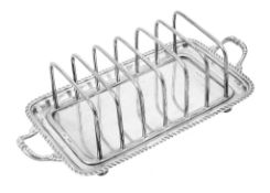 A late Victorian silver rectangular six division toast rack by Atkin Brothers A late Victorian