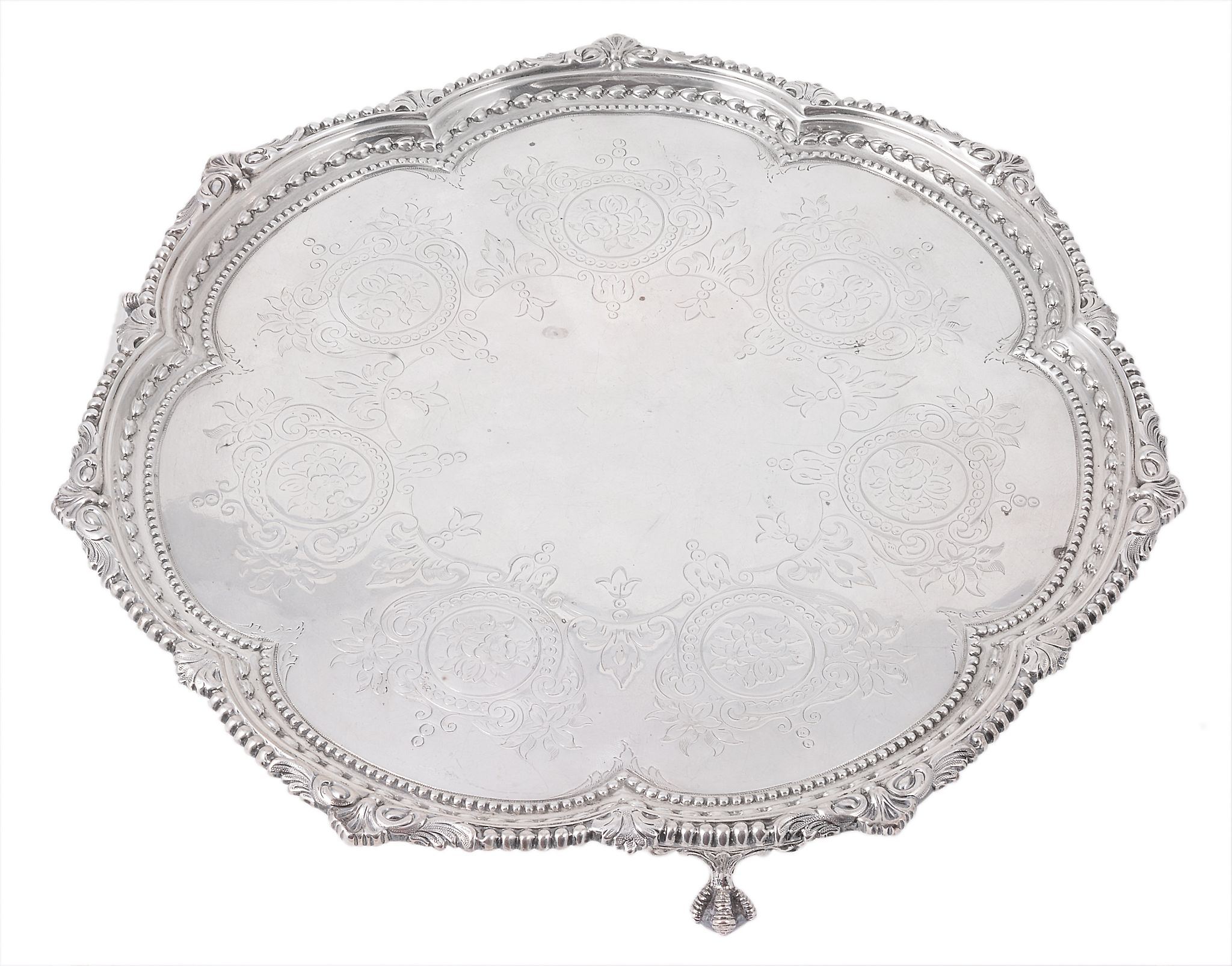 A Victorian silver shaped circular salver by Martin, Hall & Co A Victorian silver shaped circular