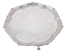 A Victorian silver shaped circular salver by Martin, Hall & Co A Victorian silver shaped circular