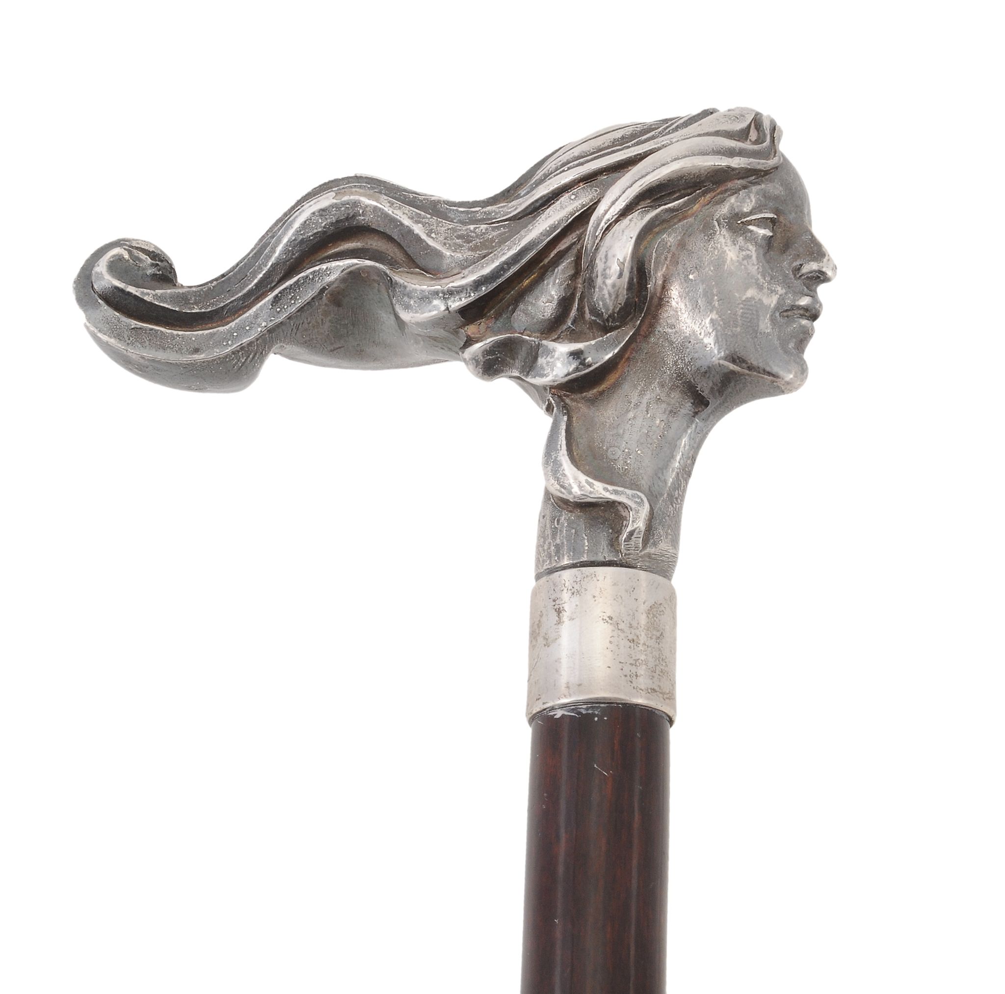 A silver mounted walking stick, with a Continental female head handle A silver mounted walking