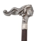 A silver mounted walking stick, with a Continental female head handle A silver mounted walking