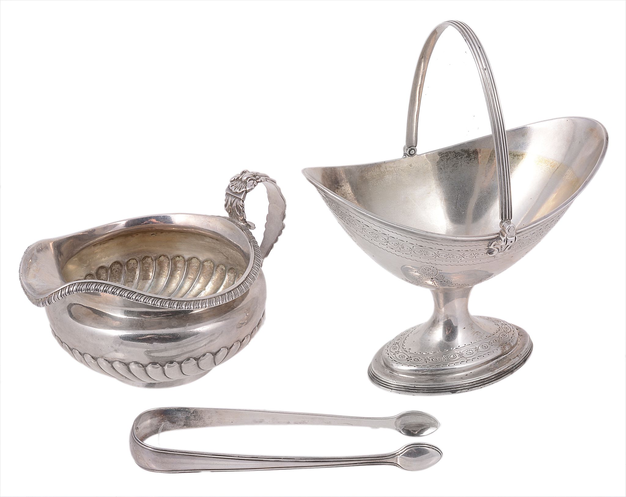 A Victorian silver oval boat shaped sugar basket, maker`s mark obscured A Victorian silver oval boat