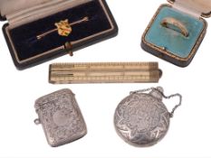A collection of items, including: a 22 carat gold wedding band, also stamped A collection of