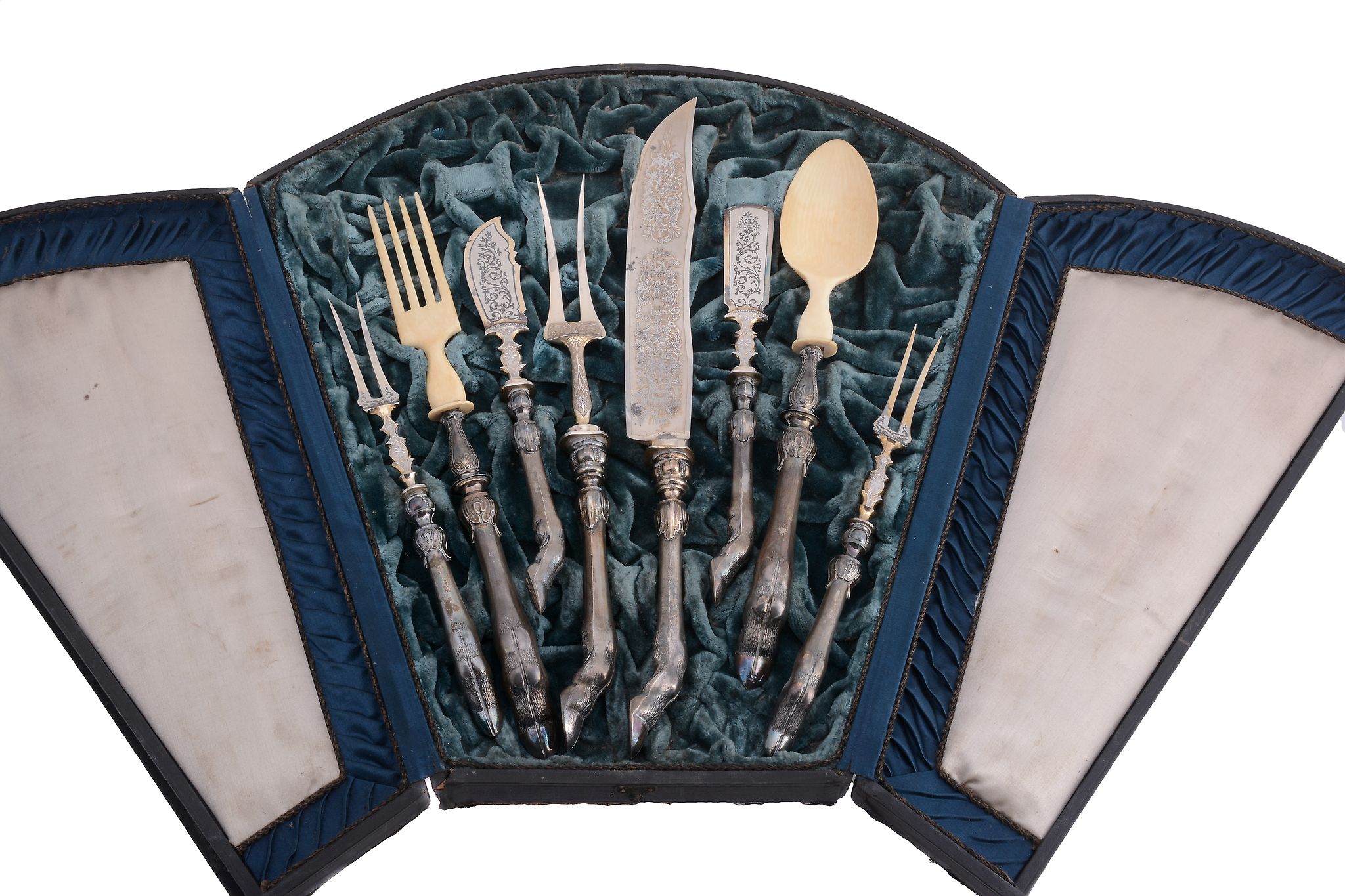 A cased German electro-plated eight piece carving set, with hoof terminals A cased German electro-