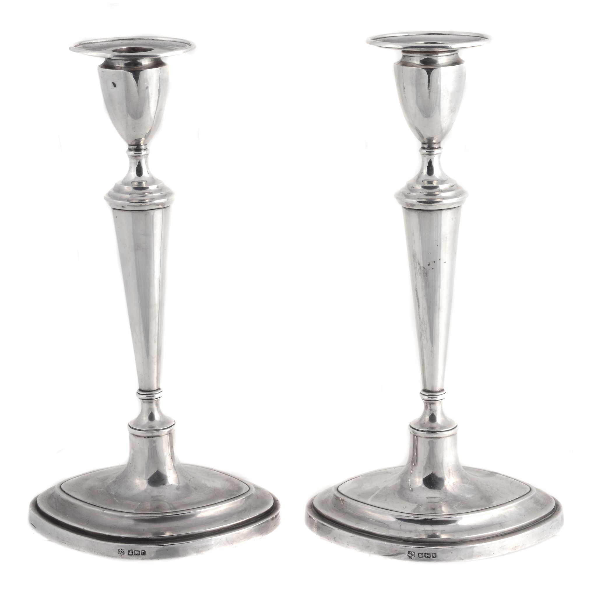 A pair of silver navette shape candlesticks by Hawksworth, Eyre & Co A pair of silver navette