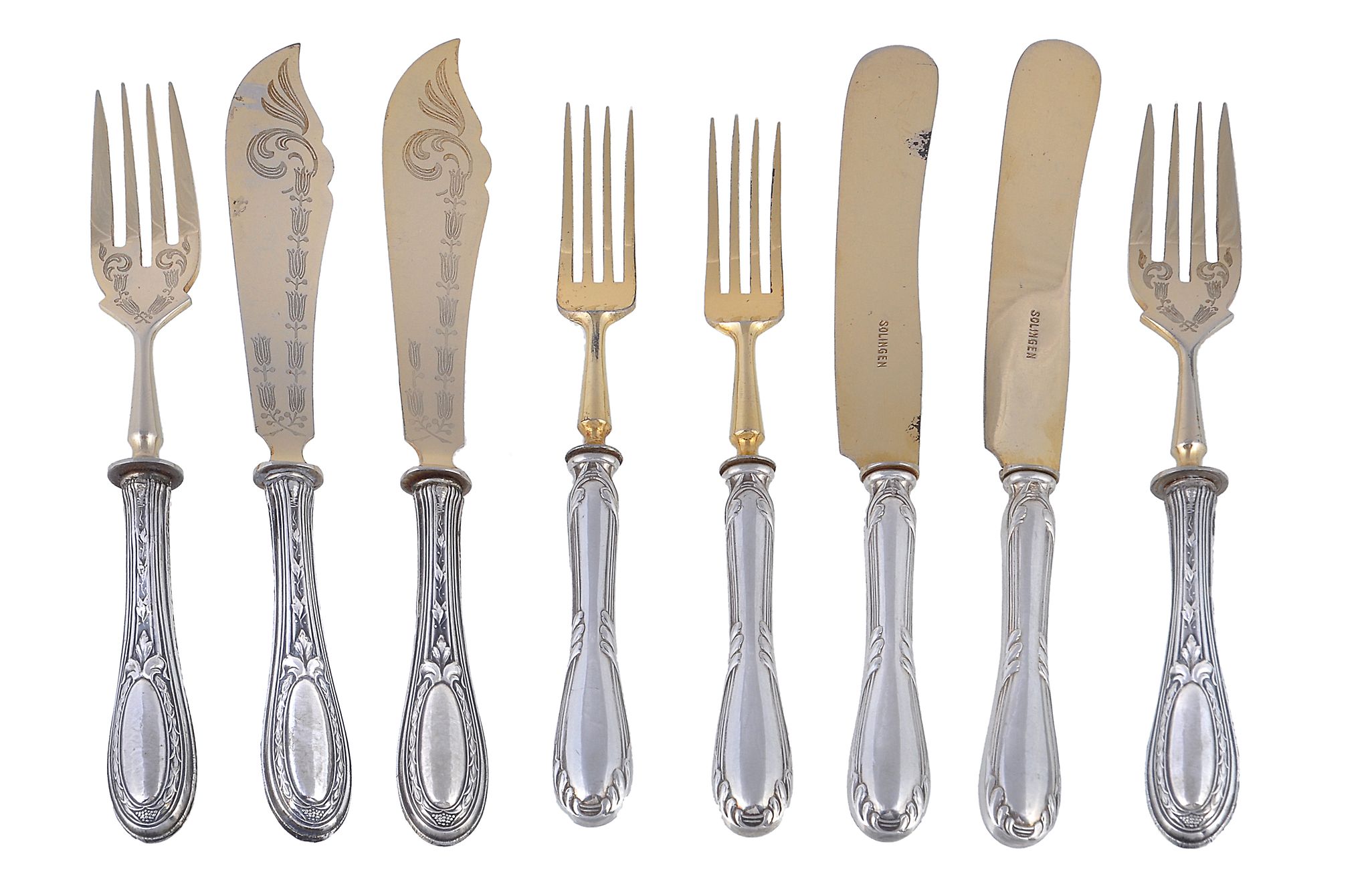 Two sets of Italian parcel gilt knives and forks with loaded silver coloured... Two sets of