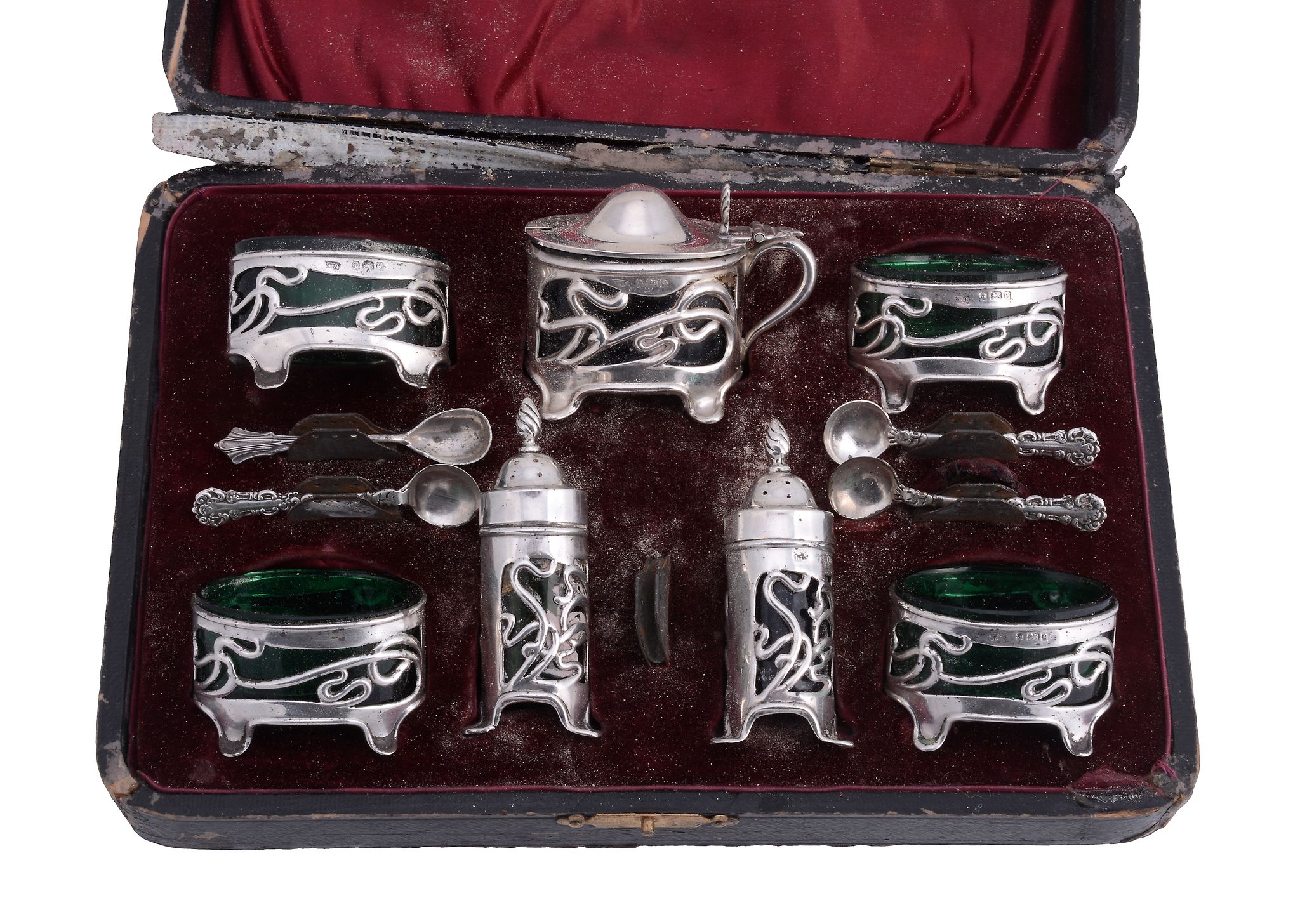 An Art Nouveau silver seven piece cruet set by William Devenport An Art Nouveau silver seven piece